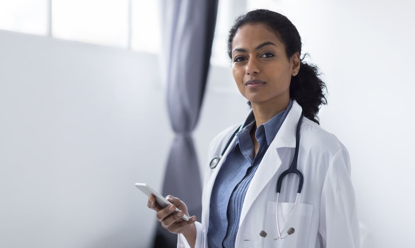 Clinician with phone in hand