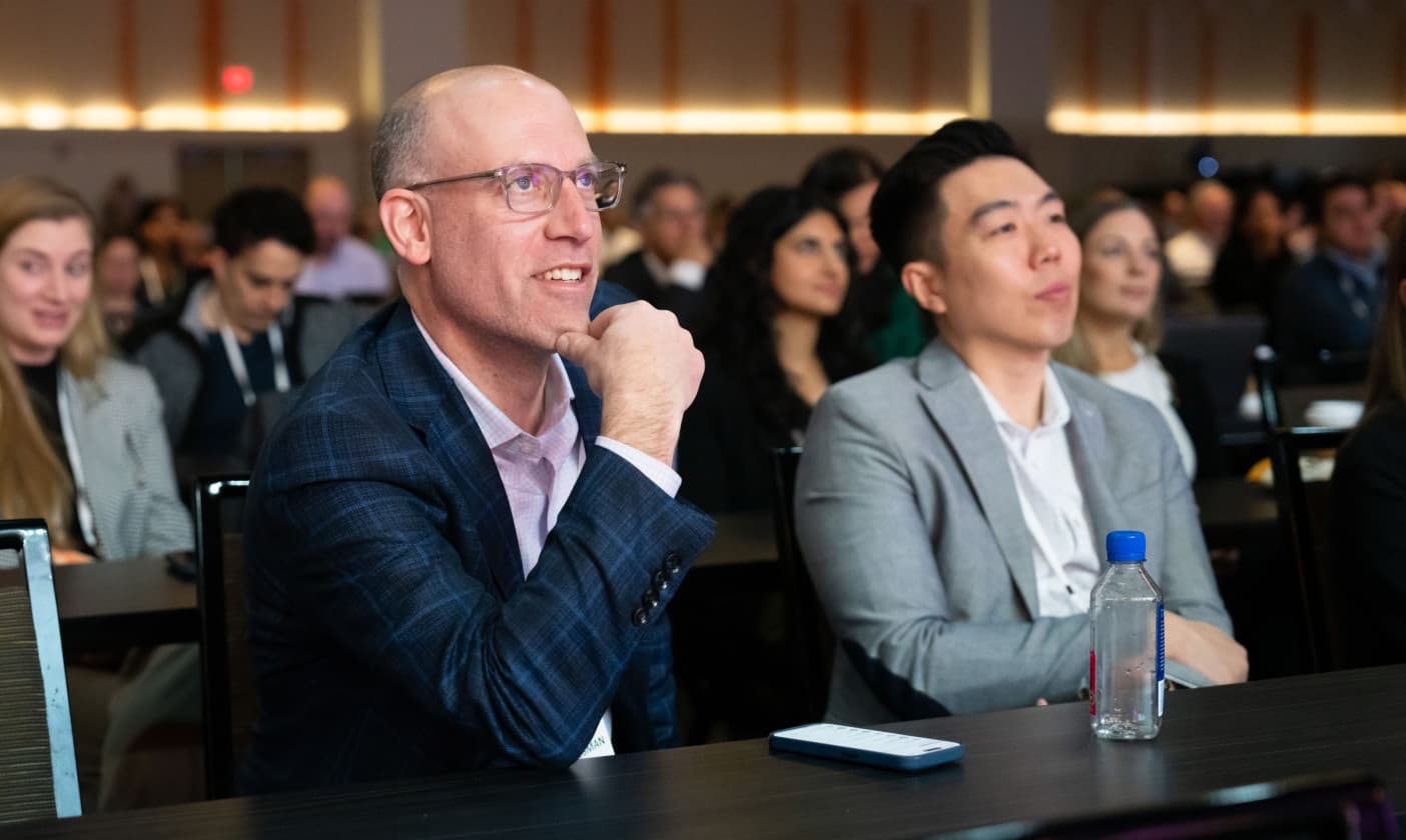 Engaged attendees at a live HMP Global event